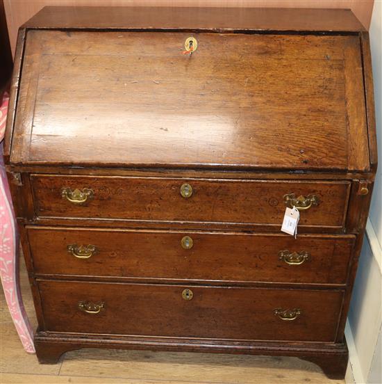 An 18th century oak bureau W.92cm